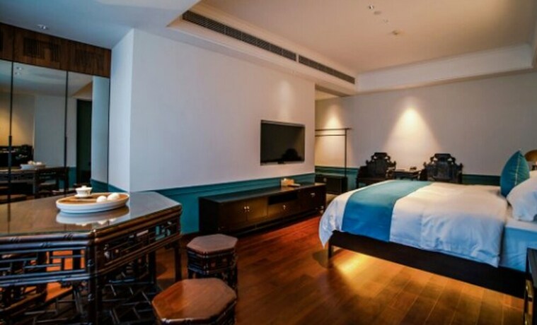 Imagen de la habitación del Hotel East Sea Chaozhou. Foto 19