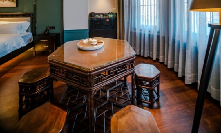 Imagen de la habitación del Hotel East Sea Chaozhou. Foto 20