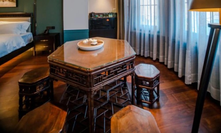 Imagen de la habitación del Hotel East Sea Chaozhou. Foto 21