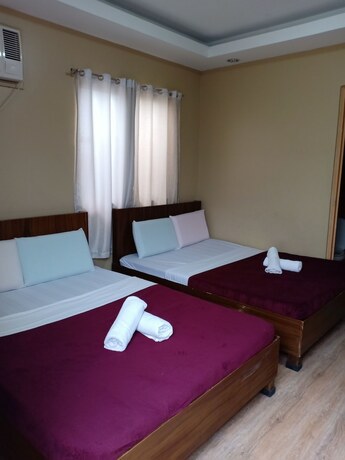 Imagen de la habitación del Hotel East Square Inn. Foto 14