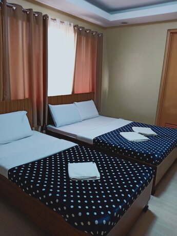 Imagen de la habitación del Hotel East Square Inn. Foto 15