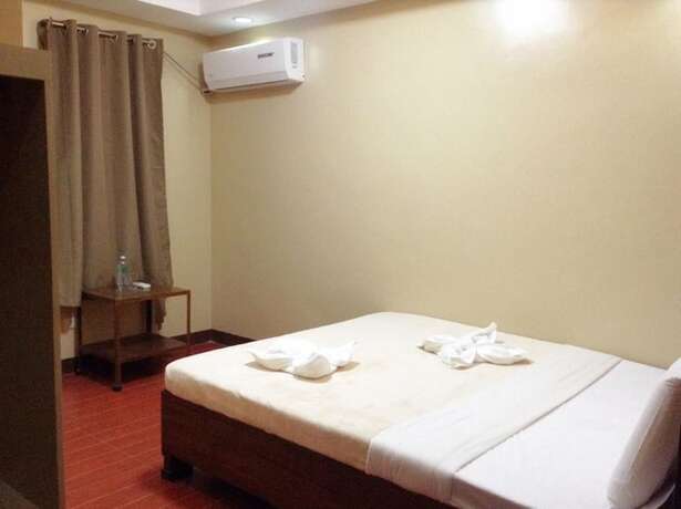 Imagen de la habitación del Hotel East Square Inn. Foto 16