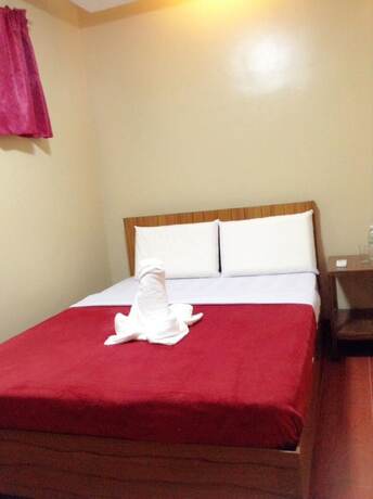 Imagen de la habitación del Hotel East Square Inn. Foto 17