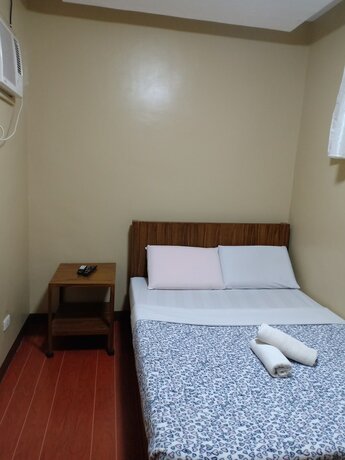 Imagen de la habitación del Hotel East Square Inn. Foto 18