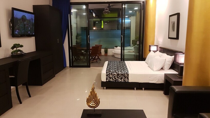 Imagen de la habitación del Hotel East Suites. Foto 11