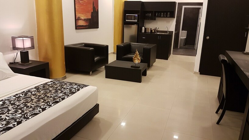 Imagen de la habitación del Hotel East Suites. Foto 12