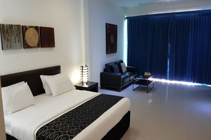 Imagen de la habitación del Hotel East Suites. Foto 13