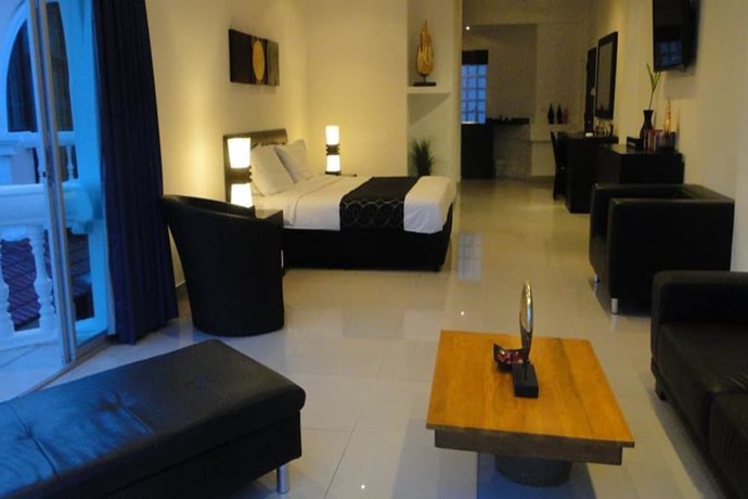 Imagen de la habitación del Hotel East Suites. Foto 16