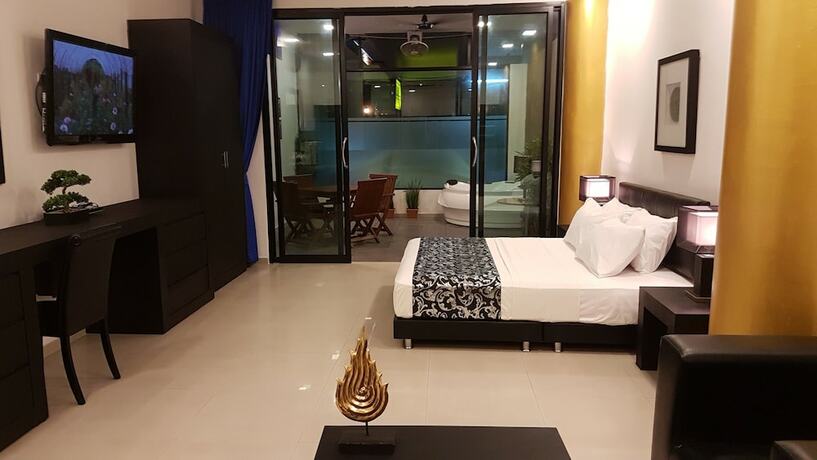 Imagen de la habitación del Hotel East Suites. Foto 19