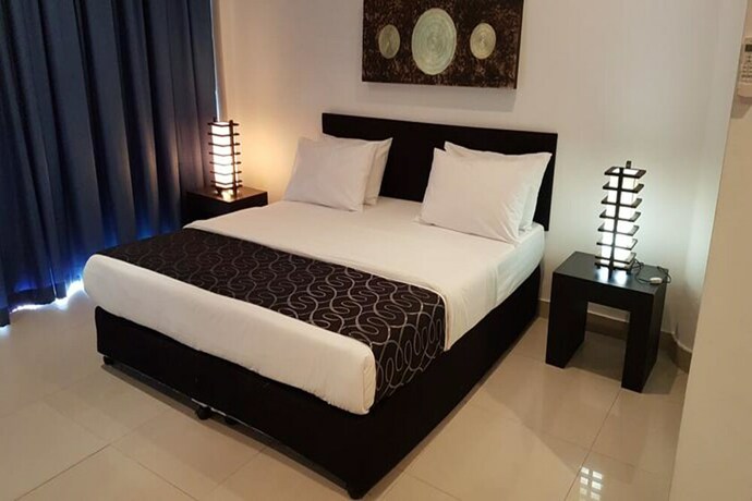 Imagen de la habitación del Hotel East Suites. Foto 21