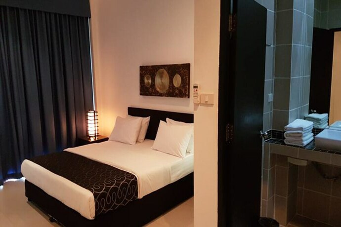 Imagen de la habitación del Hotel East Suites. Foto 29