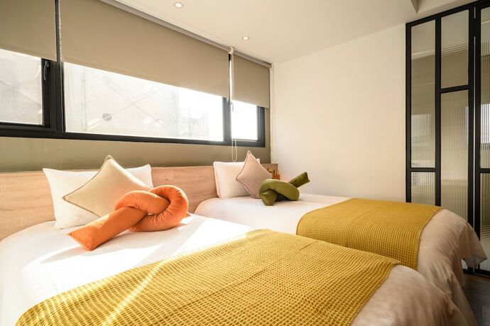 Imagen de la habitación del Hotel East Taichung. Foto 17