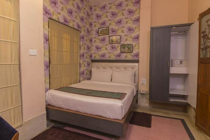 Imagen de la habitación del Hotel East View, Varanasi. Foto 8