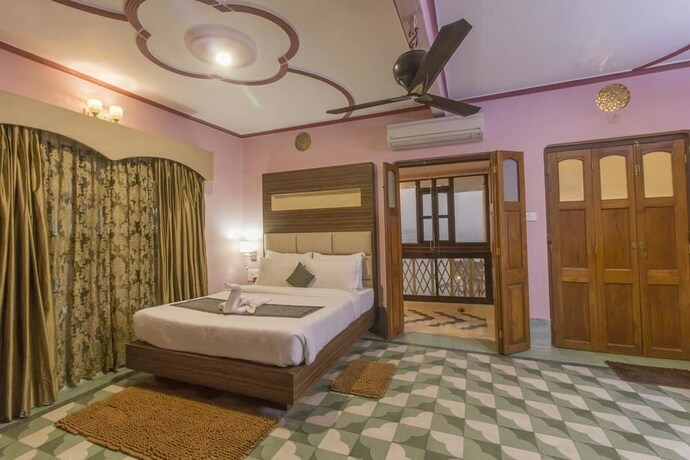 Imagen de la habitación del Hotel East View, Varanasi. Foto 9
