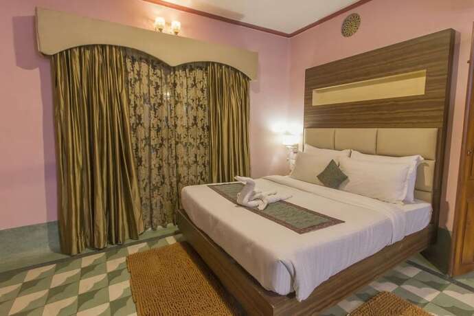 Imagen de la habitación del Hotel East View, Varanasi. Foto 10