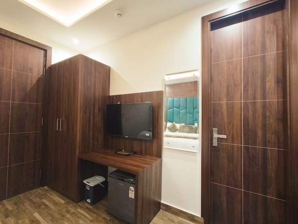 Imagen de la habitación del Hotel East Wood Amritsar. Foto 9