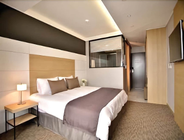 Imagen de la habitación del Hotel Eastern Hotel Jeju. Foto 9