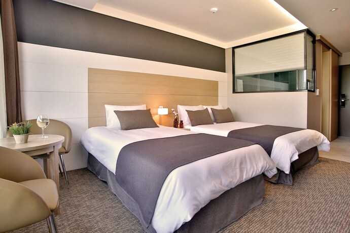 Imagen de la habitación del Hotel Eastern Hotel Jeju. Foto 2