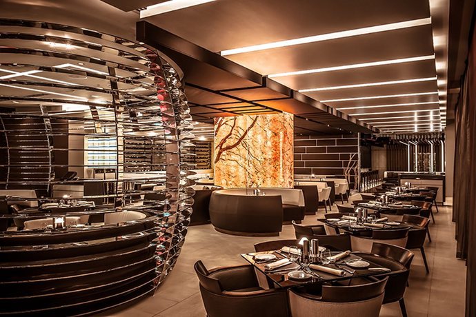 Imagen del bar/restaurante del Hotel Eastern Mangroves Suites By Jannah. Foto 4