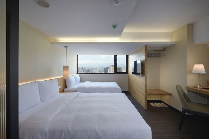 Imagen de la habitación del Hotel Eastin Taipei. Foto 14