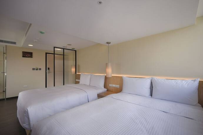 Imagen de la habitación del Hotel Eastin Taipei. Foto 15