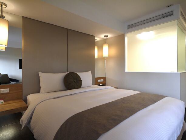 Imagen de la habitación del Hotel Eastin Taipei. Foto 18