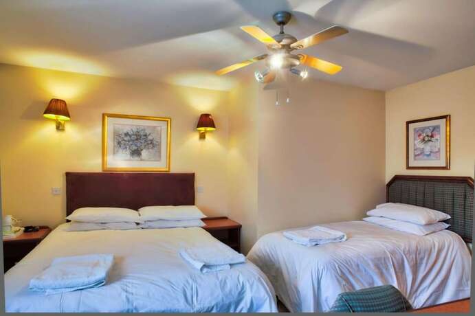 Imagen de la habitación del Hotel Easton Guest House. Foto 14