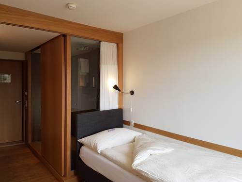 Imagen de la habitación del Hotel East-west Riverside. Foto 11