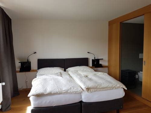 Imagen de la habitación del Hotel East-west Riverside. Foto 16