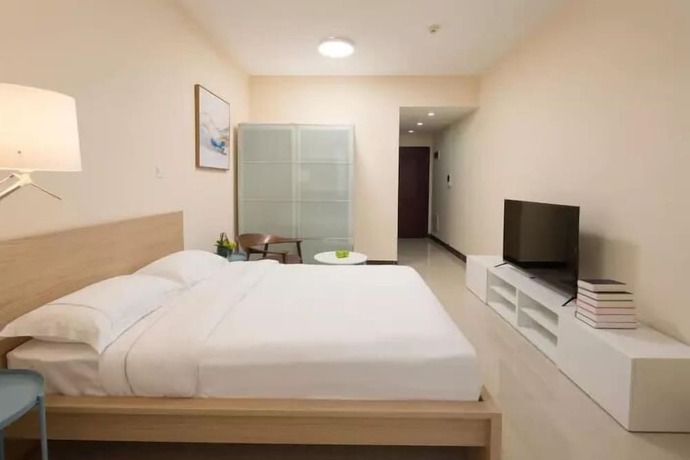 Imagen de la habitación del Hotel Easy Apartment - Guangzhou East Railway Station. Foto 12