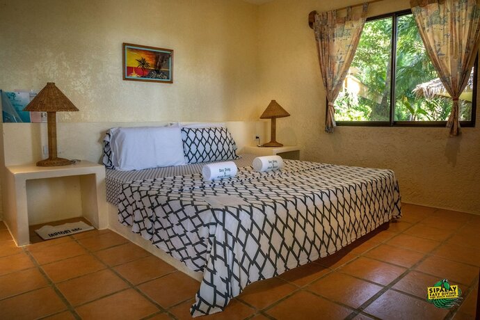 Imagen de la habitación del Hotel Easy Diving and Beach Resort. Foto 20
