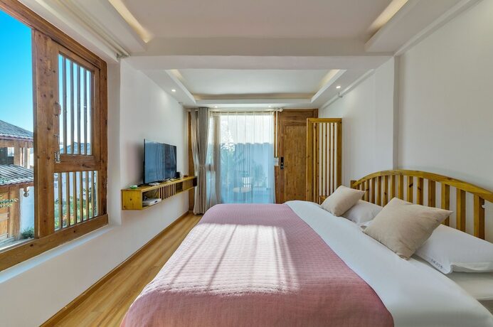 Imagen de la habitación del Hotel Easy Inn, Lijiang. Foto 14