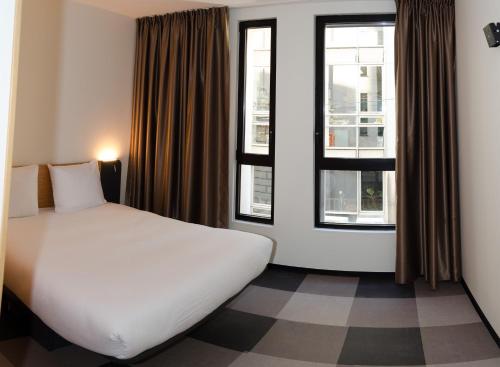 Imagen de la habitación del Hotel Easyhotel Brussels City Centre. Foto 3