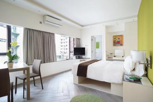 Imagen de la habitación del Hotel Eaton Residences, Village Road. Foto 6