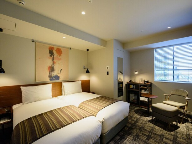 Imagen de la habitación del Hotel Ebisuholic. Foto 32