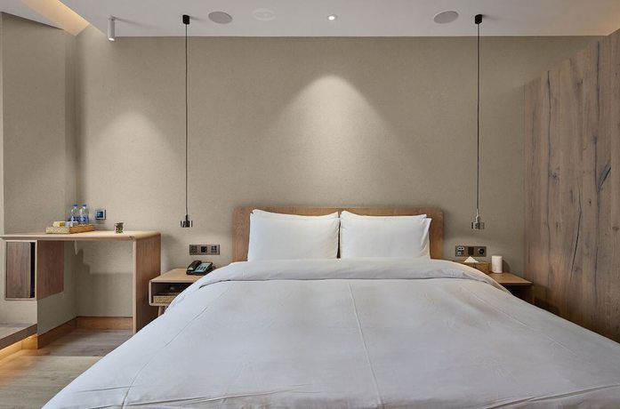 Imagen de la habitación del Hotel Ebo Hangzhou Wulinmen. Foto 3