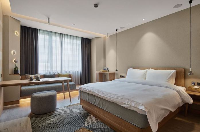 Imagen de la habitación del Hotel Ebo Hangzhou Wulinmen. Foto 7