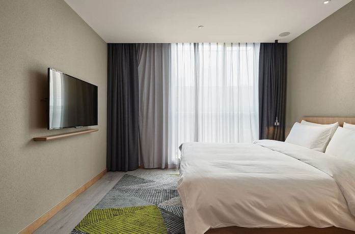 Imagen de la habitación del Hotel Ebo Hangzhou Wulinmen. Foto 10
