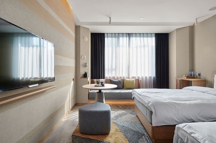 Imagen de la habitación del Hotel Ebo Hangzhou Wulinmen. Foto 16