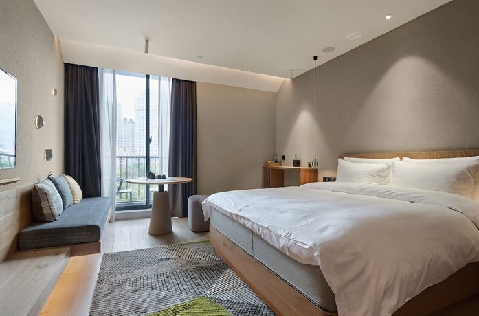 Imagen de la habitación del Hotel Ebo Hangzhou Wulinmen. Foto 19