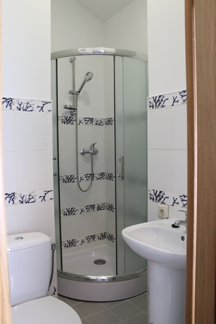 Imagen de la habitación del Hotel EcOlive Apartments. Foto 6