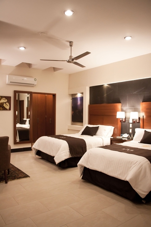 Imagen de la habitación del Hotel Ecce Inn and Spa. Foto 3