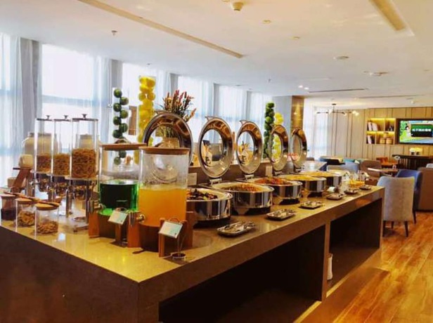 Imagen del bar/restaurante del Hotel Echarm Chimelong Station. Foto 3