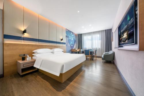 Imagen general del Hotel Echarm Chongqing Kaizhou Sports Square Branch. Foto 3