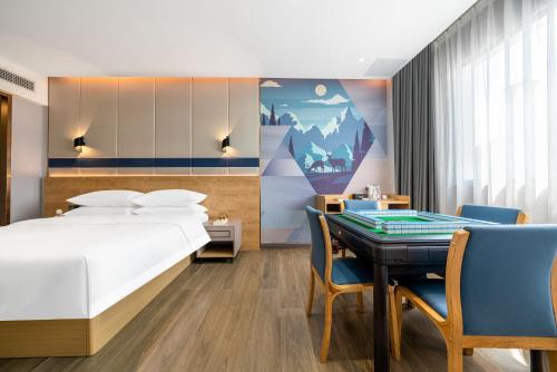 Imagen general del Hotel Echarm Chongqing Kaizhou Sports Square Branch. Foto 10