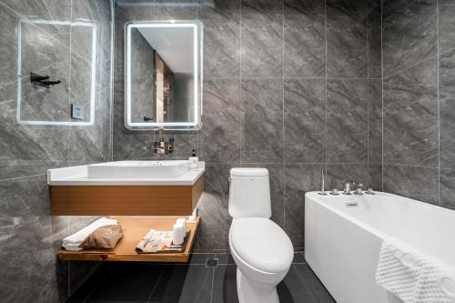 Imagen general del Hotel Echarm Chongqing Kaizhou Sports Square Branch. Foto 11