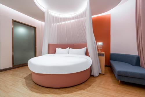 Imagen general del Hotel Echarm Chongqing Kaizhou Sports Square Branch. Foto 13