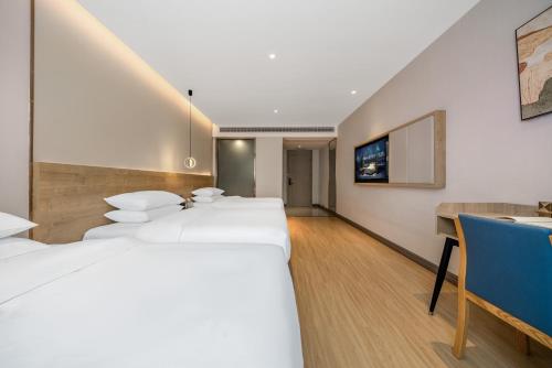 Imagen general del Hotel Echarm Chongqing Kaizhou Sports Square Branch. Foto 15