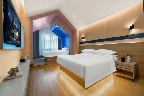 Imagen de la habitación del Hotel Echarm Chongqing Kaizhou Sports Square Branch. Foto 19
