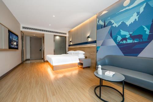 Imagen de la habitación del Hotel Echarm Chongqing Kaizhou Sports Square Branch. Foto 20